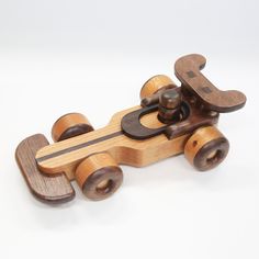 a wooden toy car made out of wood