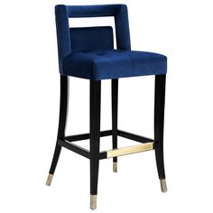 a blue velvet bar stool with gold trimmings on the legs and backrest