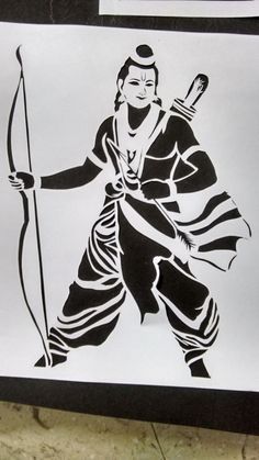 a drawing of a man with a bow and arrow in his hand is shown on a piece of paper