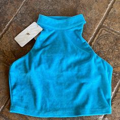 Terri Cloth Cropped Length Racer Back Mock Neck New! Blue Crop Top Activewear For Sports, Blue Athleisure Crop Top For Summer, Blue Sports Crop Top Activewear, Blue Cropped Activewear For Summer, Blue Sports Crop Top, Sporty Blue Crop Top For Beach, Blue Crop Top For Gym, Blue Cropped Top For Workout, Blue Cropped Workout Crop Top