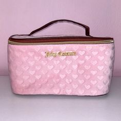 Juicy Couture Travel Cosmetic Bag Light Pink And Brown. Cosmetic Bag New! Never Used. Great Condition. As Is As Shown. No Holes Or Stains, No Fade. Material Content Is Velour. Gold Details With Heart Design. Smoke Free Home Pink Rectangular Cosmetic Bag For Daily Use, Rectangular Pink Cosmetic Bag For Daily Use, Trendy Pink Portable Cosmetic Bag, Trendy Pink Rectangular Cosmetic Bag, Large Capacity Pink Pouch Cosmetic Bag, Large Capacity Pink Cosmetic Bag Pouch, Pink Bags With Zipper Closure For Gifts, Pink Bag With Zipper Closure For Gift, Pink Bag With Zipper Closure As Gift