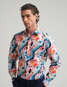 Step into a world of bold expression with The Colourful Swirl Cotton Shirt. Featuring a dynamic and eye-catching swirl print in vibrant hues of pink, blue, orange, and black, this shirt is designed for those who love to stand out. Made from soft, breathable cotton, it combines comfort with a splash of creativity, making it perfect for both casual and statement-making occasions. With its unique abstract design, this limited-edition shirt is your go-to for adding a touch of artistic flair to your wardrobe. Pair it with tailored trousers or denim for an effortlessly cool look. 100% Cotton   Machine Washable Animal Print Party, Knit Loungewear, Limited Edition Shirt, Stocking Fillers For Him, Stocking Fillers For Her, Holiday Party Outfit, Independent Designers Fashion, Bridal Collection, Cotton Shirt