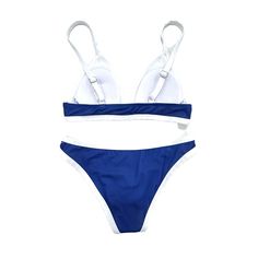 "Get ready to make a splash in this navy blue color block bikini for women. With its unique design and playful color combination, you'll stand out at the beach or pool. Perfect for those who love to have fun in the sun (and look stylish doing it)!" White Swimwear With Contrast Color For Swimming, White Contrast Color Swimwear For Swimming, White Swimwear With Contrast Color For Pool, Two-tone Color Block Swimwear For Poolside, White Contrast Color Swimwear For Pool, Two-tone Color Block Swimwear For Swimming, Blue Swimwear For Surfing Beach Season, Two-tone Swimwear For Poolside, Blue Swimwear For Surfing In Beach Season