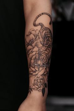 42 Awesome Tiger Tattoo Design Ideas Mother Tiger Tattoo, Tiger Full Body Tattoo, Tiger Koi Fish Tattoo, Bengal Tiger Tattoo For Women, Tiger Tattoo Forearm Women, Tiger With Butterfly Tattoo, Tiger Arm Sleeve Tattoo, Men’s Tiger Tattoo, Back Tiger Tattoo For Women