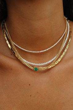 18k yellow gold cuban link necklace with emerald cut emerald center .45cts Colombian emerald  Shown with the large diamond hepburn choker 16" and the bunny necklace.  #AKNCBEM-4-YG Colombian Jewelry, Inexpensive Jewelry, Bunny Necklace, Cuban Link Necklace, Necklace Outfit, Emerald Necklace, Minimal Jewelry, Jewelry Lookbook, The Bunny