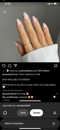 a person's hand with pink nail polish on it and the caption below