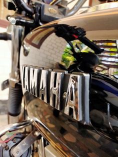 a close up of the nameplate on a motorcycle