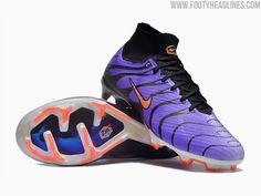 the nike air vapor is purple and black with orange accents on the upper part of the shoe