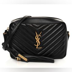 Saint Laurent Ysl Monogram Matelasse Lou Camera Crossbody Tassel Leather Bag Coa Smooth Black Leather, Matelasse Pattern At Face And Back Signature "Ysl" Yellow Gold Toned Hardware At Face "Saint Laurent Paris" In Metal On Tassel And Plaque Yellow Gold Toned Hardware Throughout, Including Zipper Twill Lining, Single Interior Pocket Zip Closure At Top Approx. 21.75" Adjustable Leather Strap Drop 8.5"W X 6.75"H X 2.5"D From The 2019 Collection By Anthony Vaccarello Made In Italy Fly574994 - 0919 In Very Good Preloved Condition With Limited Signs Of Wear, Please Review Images Closely **Professionally Authenticated! Certification Of Authenticity (Coa) Provided By Entrupy ***Free Shipp Ysl Lou Camera Bag Black, Yves Saint Laurent Bags, Anthony Vaccarello, Saint Laurent Paris, Tassels, Yves Saint Laurent, Leather Bag, Leather Straps, Saint Laurent