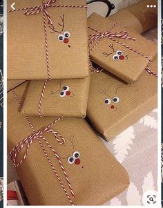 several wrapped presents with reindeer faces on them