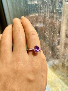 Amethyst Ring with a beautiful purple center stone! That is just the beginning though! The halo also has Amethyst stones, and they do not hide the purple Amethyst center stone still! This ring also has white diamonds on the shank! This ring is marvelous with its different range of colors!  14K Rose Gold- 2.32 grams Round Diamonds- 0.13 CTS Round Amethyst- 0.08 CTS Oval Amethyst- 0.43 CTS Ring Size US 7 100% Solid Gold  100% Natural Amethyst and Diamonds Purple Oval Brilliant Cut Ring, Amethyst Rings With Brilliant Cut, Oval Amethyst Ring In Halo Setting Yellow Gold, Oval Amethyst Ring In Yellow Gold With Halo Setting, Oval Yellow Gold Amethyst Ring With Halo Setting, Purple Oval Diamond Ring, Elegant Oval Purple Rings, Oval Amethyst Ring With Brilliant Cut For Anniversary, Oval Brilliant Cut Amethyst Ring In Fine Jewelry Style