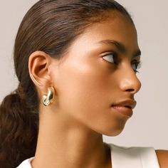 Elevate every look with our bold Bagel Hoop earrings - your go-to statement accessory for daily wear and casual outings alike. Perfectly versatile, they add a touch of sophistication to any ensemble, ensuring you're stylishly accessorized all day long 18k gold plated stainless steel 30mm diameter 10mm wide Hair Unit, Polish Jewelry, Rhodium Plated, Stylish Outfits, Daily Wear, Solid Gold, 18k Gold, Hoop Earrings, Stainless Steel