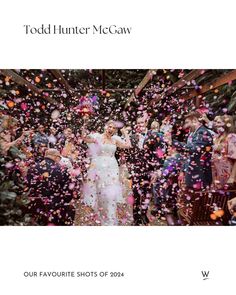 a wedding photo with confetti falling from the sky and guests in the background