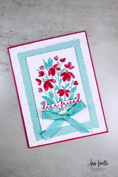 a handmade card with flowers on it