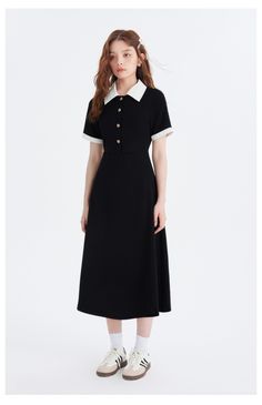 A casual polo dress with a distinctive contrast between black and white. The golden buttons decorated on the chest make it stand out. The waist is high, giving you a beautiful silhouette. A casual item that adds a touch of elegance. 
 
 
 
 
 
 
 
 
 
 
 
 
 
 
 
 
 
 
 
 
 
 
 
 
 
 
 
 
 
 
 
 
 
 
 
 
 
 
 
 
 
 
 
 
 
 
 
 
 
 
 
 
 
 
 
 
 
 
 
 
 
 
 
 
 
 
 
 
 
 
 
 
 
 
 
 
 
 
 
 
 
 
 Size 
 
 S size 
 
 
 Length: 120cm 
 Bust: 84cm 
 Waist: 68cm 
 Sleeve length: 25cm 
 
 M size 
 
 L Classic Polo Dress With Collared Neckline For Workwear, Black Collared Dress With Placket, Black Buttoned Midi Dress For Semi-formal Occasions, Black Semi-formal Midi Dress With Buttons, Semi-formal Black Midi Dress With Buttons, Classic Knee-length Polo Dress For Work, Classic Black Midi Dress With Button Closure, Classic Collared Midi Dress, Classic Black Dress With Collared Neckline