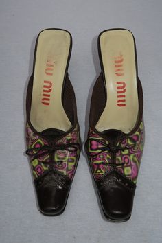 "Miu Miu A/W 1999 Holographic Mule Runway Collection. Holographic print changes with the light. marked size: 35 IT  fits: US 4.5/5 (fits narrow) length: 8.5\" condition: Excellent vintage condition.   All sales are final. Please note that signs of wear are normal for vintage and pre-loved items. All items have been hand-picked by LAV and are in top vintage condition." Vintage Mui Mui, Y2k Holographic, Holographic Shirt, Holographic Boots, Holographic Jacket, Holographic Purse, Holographic Dress, Vintage Miu Miu, Holographic Heels