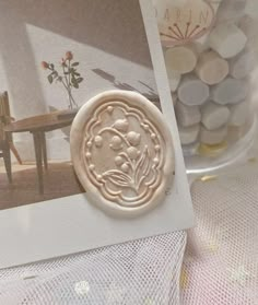 there is a stamp that has been placed in front of a photo and some other things