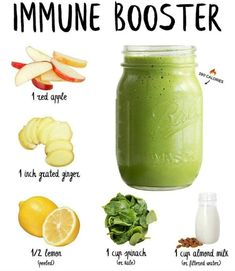 an image of a green smoothie in a mason jar with ingredients to make it