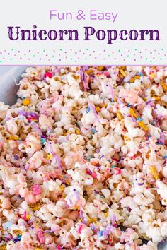 a bowl filled with unicorn popcorn and sprinkles