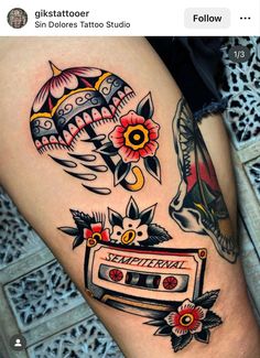 an old school style thigh piece with some flowers and music tape recorders on it