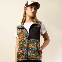 Crafted with a nostalgic touch this vest features a soft and warm fleece fabric that keeps you cozy and stylish in cooler weather. With its timeless design, versatile zip-up front, and convenient pockets, it's the perfect layering piece to add a touch of retro charm to any outfit. Full Zip Vest Woven patch pocket with secure zipper Fleece lined stand collar Fleece Vest Women, Hiking Jacket, Fleece Vest, Womens Fleece, Cooler Weather, Cycling Outfit, Layering Pieces, Fleece Fabric, Womens Vest