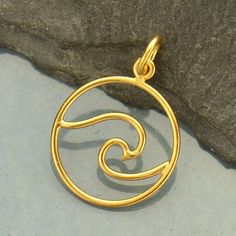 Sterling Silver Wave Pendant. Add a modern touch of beachy vibes to your look with this fun and curvy wave pendant. Silver wire is hand-formed into this playful shape, creating a gorgeous and fluid wave. The perfect charm for any beach lover! They measure approximately 21mm x 15mm x 1mm. Length measure includes 5mm soldered jump ring. The purchase of this listing includes one (1) Sterling Silver Wave Pendant. If you would like additional Sterling Silver Wave Pendants, please select the quantity Wave Pendant, Wave Jewelry, Nautical Bracelet, Beachy Vibes, Gold Waves, Nautical Jewelry, Quartz Crystal Necklace, Beach Lover, Dragon Pendant