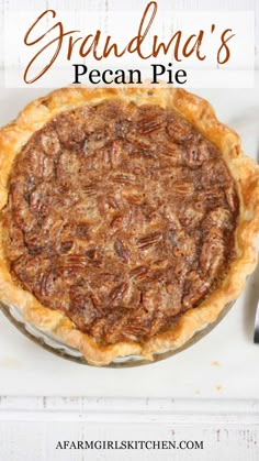 homemade pecan pie with text overlay that says homemade pecan pie on it