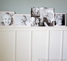 a white cabinet with pictures on it