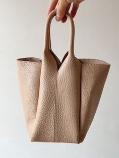 Elena Handbags Chic Leather Bucket Bag Tan Bucket Bag With Handles, Beige Leather Bucket Bag For Errands, Light Brown Soft Leather Bucket Bag For Daily Use, Light Brown Everyday Bucket Shoulder Bag, Tan Top Handle Bucket Bag For Daily Use, Light Brown Bucket Tote Bag For Shopping, Light Brown Bucket Tote Bag For Daily Use, Light Brown Tote Bucket Bag For Shopping, Light Brown Tote Bucket Bag For Daily Use