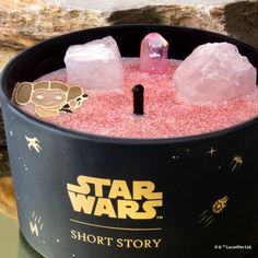 a star wars shot story is in a bucket with ice cubes and pink sand