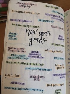 an open notebook with writing on it that says new year's goals