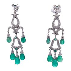 This is part of Chairish’s Fine Jewelry assortment.  These gorgeous Chandelier Earrings are just beautiful.  They are made in 14K white Gold and set with five (5) Emerald Cabochon drops, three (3) small Emeralds are studded within the Diamonds. The length is 5.5 cm or 2 1/2" long.  These earrings pack a punch as they are just stunning.  There are probably approximately 2 carats of Diamonds  throughout.  These earrings are lovely by themselves but I also have a gorgeous pendant that works perfect Fine Jewelry Chandelier Earrings With 17 Jewels, Fine Jewelry Chandelier Drop Earrings, Classic Chandelier Dangle Earrings With 17 Jewels, Elegant Briolette Gemstone Chandelier Earrings, Elegant Gemstone Dangle Chandelier Earrings, Earrings Pack, Emerald Cabochon, Diamond Chandelier, Just Beautiful