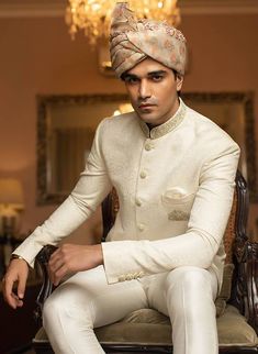 Classic Sherwani For Wedding And Festive Occasions, Elegant White Formal Kurta, Classic Wedding Sherwani For Festive Occasions, Classic Wedding Sherwani For Festive Season, Fitted Classic Traditional Wear For Wedding, Classic Festive Wedding Sherwani, Classic Sherwani With Naqshi For Wedding, Classic Bandhgala For Eid Festival, Classic Bandhgala For Eid Festivities