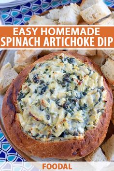 an easy homemade spinach artichoke dip is served in a bread bowl with crackers on the side