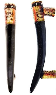 two black and orange handles are shown against a white background, one is shaped like an animal's tail