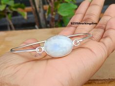 Moonstone Bangle, Minimalist Bangle, Gemstone Bangle, Moonstone Jewelry, Adjustable Bangle, 925 Sterling Silver, Woman Bangle, Handmade  Benefits of Wearing Moonstone Helps in spiritual growth. Enhances positivity and peace of mind. Helps in self-healing and inner peace, balance. Helps to ease out the aggressive side. Brings peace and stability to those who are aggressive, impulsive and insensitive. Description We can supply jewelry in bulk , For Wholesale Quantity and Discounts please contact. Silver Minimalist Moon Bracelet, Sterling Silver Moonstone Bracelet Gift, Handmade Minimalist Moonstone Bracelets, Minimalist Handmade Moonstone Bracelets, Minimalist Bangle, Gemstone Bangle, Adjustable Bangle, Moonstone Jewelry, Self Healing