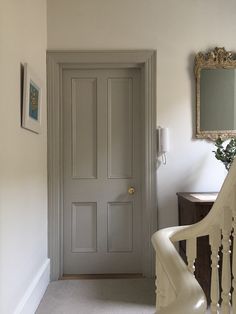 the hallway is clean and ready to be used as a home decorating area for guests