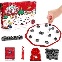 a christmas board game is shown with its contents