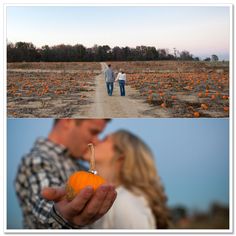 a couple walking down a dirt road with pumpkins on the ground and an orange in their hand