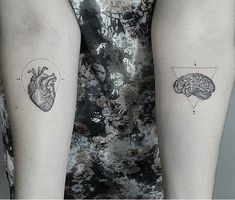 two people with tattoos on their arms, one has a heart and the other has a brain