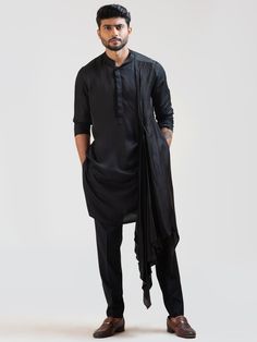 This Black Double Panel Nehru Kurta Set will instantly give an elegant look. This 3 piece kurta set features a silk black kurta with long drape style, terrycot double panel honeycomb Nehru jacket, invisible front button placket, and a mandarin collar. It is paired with narrow fitted pajama pants in black color and malai cotton fabric. An ideal outfit for traditional occasions, and special events.
Ready to Ship – Size Large

Size Chart For Men





	
	
					Men's Size Chart
		

		
		
						
				S Black Kurta, Pyjama Pants, Long Drapes, Black Drapes, Nehru Jackets, Pajama Pant, Steam Iron, Pernia Pop Up Shop, Cotton Pyjamas