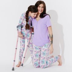 Unleash your inner superhero with our Comic Purple Bamboo Women's Pajama Set! Made from luxurious bamboo fabric, this set is as soft as a cloud and as vibrant as a comic book. Featuring a playful purple design with comic-inspired prints, it's the perfect blend of comfort and fun. Whether you're lounging at home or saving the world in your dreams, this pajama set has got you covered. Upgrade your sleepwear collection today! Stylish and Functional Top: Scoop neck long-sleeve top with elegant snaps Stretch Cotton Purple Sleepwear, Purple Cotton Stretch Sleepwear, Stretch Cotton Sleepwear In Purple, Playful Purple Sleepwear For Pajama Party, Playful Purple Sets For Pajama Party, Stretch Purple Sleepwear For Loungewear, Purple Stretch Sleepwear For Pajama Party, Casual Purple Bedtime Sets, Purple Bamboo