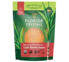 a bag of light brown sugar sits on a white surface with the words florida crystals