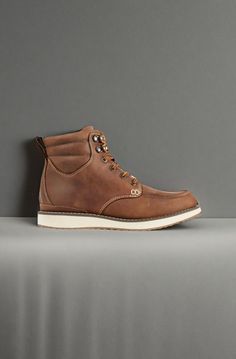 A rugged, workwear-inspired moc toe leather boot with sneaker-like comfort and all-day support. Order regular shoe size. (For half sizes not offered, order up to next whole size). Suggested Sock: Midweight. Padded collar and gusseted tongue to keep out debris. Waterproof Nor'easter leather for weather and stain protection. Lightweight, molded EVA midsole and outsole for lightweight comfort. Synthetic lining is moisture wicking and fast drying. Molded rubber perimeter outsole for traction and dur Brown Lace-up Boots With Goodyear Welt For Outdoor Work, Casual Brown Moto Boots With Steel Toe, Rustic Lace-up Leather Work Boots, Rugged Work Boots With Goodyear Welt Construction For Outdoor, Rugged Moto Boots With Reinforced Toe For Outdoor, High-top Work Boots With Goodyear Welt For Outdoor, Rugged High-top Lace-up Boots With Reinforced Toe, Rugged Work Boots With Steel Toe For Walking, Goodyear Welt High-top Work Boots For Outdoor Work