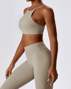 Made from our signature naked fabric Moderate support sports bra High neckline Adjustable shoulder straps Racer back silhouette Open back design 4 way stretch Sweat wicking and breathable Model: Bust 88cm, Waist 60cm, Hip 102cm, Height 174cm, Weight 55kg, Wears size S Our High Neck Open Back Sports Bra is a slinky design that moves with your body and allows for ultimate second skin comfort. Cut to a standard sports bra length, it is a racer back design with multiple adjustable straps. Sports Bra With Built-in Bra And T-back, Sports T-back Bra With Built-in Support, Compressive T-back Sports Bra For Yoga, High Stretch Activewear With Built-in Bra For Light Sports, Sportswear T-back Sports Bra For Yoga, Racerback Activewear With Built-in Bra For Light Sports, High Stretch T-back Sports Bra For Gym, Moisture-wicking T-back Sports Bra For Gym, Versatile Breathable Racerback Sports Bra