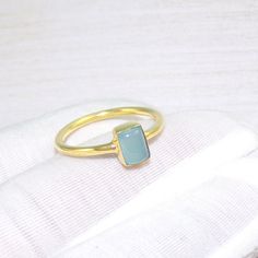 This handcrafted jewelry is made by Crystal Legacy . For each piece , we handpick the best gemstone and ensure high quality craftsmanship and intrinsic designing. Buy it for yourself of for your loved ones. Chalcedony Ring, Chalcedony Rings, Chalcedony Jewelry, Tiny Ring, Boho Ring, Promise Ring, 18k Gold Plated Brass Ring, Gold Ring, For Her, Gemstone -Chalcedony Weight - 3gm Stone Size -4x8mm Metal: Brass With 18k Gold Plated Each piece is ready in stock at our store in Vancouver, Canada. Exac Chalcedony Yellow Gold Jewelry For Anniversary, Yellow Gold Chalcedony Jewelry For Anniversary, Anniversary Yellow Gold Chalcedony Jewelry, Yellow Gold Chalcedony Jewelry Gift, Gold Chalcedony Jewelry For Anniversary, Yellow Gold Chalcedony Ring Gift, Chalcedony Rings Fine Jewelry For Gift, Minimalist Gold Topaz Ring As Gift, Minimalist Gold Topaz Ring Gift