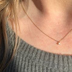 Introducing our TINY DEW DROP NECKLACE - the perfect piece for adding a subtle sparkle to any outfit. With a delicate and dainty necklace design, this piece features a tiny diamond that will catch the light just right and add a touch of elegance to your look. Trust our expertise in crafting high-quality, beautiful jewelry. 14k solid gold Dainty Diamond Solitaire Necklace With Delicate Chain, Dainty Solitaire Diamond Necklace With Delicate Chain, Minimalist Teardrop Pendant Necklaces With Diamond Accents, Minimalist Teardrop Pendant Necklace With Diamond Accents, Dainty Diamond Necklace With Delicate Chain In Diamond White, Dainty Diamond White Necklace With Delicate Chain, Delicate White Diamond Necklace For Everyday, Dainty Solitaire Necklace In Diamond White With Delicate Chain, Dainty Diamond Drop Necklace With Delicate Chain