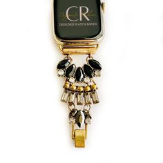 Dress up your everyday look with one of our custom-made jewelry watch bands! This is sure to be a gift that will please the girl who has everything or maybe just wants everything. This Multi-toned gold, black onyx and crystal statement bracelet Apple Watch Band is one of Copper Robin's best-selling bands. Available in Apple watch sizes 38mm, 40mm, 41mm, 42mm, 44mm, 45mm, 46mm, and 49mm It will fit all series of apple watches. Series 1-10 and SE. Available in Rose Gold, Gold, and Silver. Sizing: Luxury Black Adjustable Apple Watch Band, Modern Black Watch Bands As Gift, Elegant Black Metal Watch Accessories, Black Bracelet Strap Apple Watch Band As Gift, Custom Black Jewelry With Hardware For Gift, Adjustable Black Metal Watch Bands, Trendy Black Metal Watch Bands, Vintage Adjustable Apple Watch Band Rectangular, Vintage Adjustable Apple Watch Band