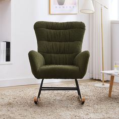 a green chair sitting on top of a rug in front of a white wall and floor