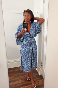 Our timeless Obaatan Kaftan embodies elegant comfort and divine femininity. Made from the most lustrous bamboo rayon, this luxurious fabric offers a modern yet feminine feel and is flattering on every figure. With its draped silhouette and fluid, feminine shape, it is the ultimate in comfort and style, in our eclectic butterfly inspired print, this is the throw on dress you'll wear again and again. Viscose V-neck Kaftan For Beach, Beach Viscose V-neck Kaftan, Flowy Wrap Midi Dress For Beach, Flowy Rayon Maxi Dress With Tie Waist, Vacation Dresses With Kimono Sleeves In Rayon, Bohemian Midi Wrap Dress For Vacation, Flowy Rayon Maxi Dress With Kimono Sleeves, Bohemian Midi Length Wrap Dress For Vacation, Flowy Tie Waist Rayon Dress